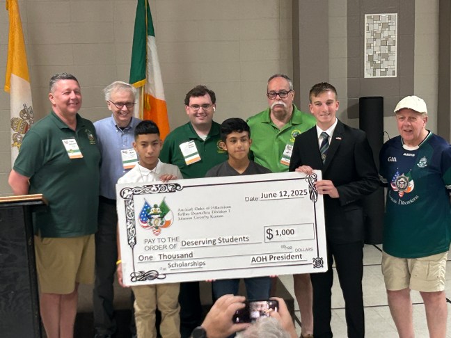 A line of Hibernians recognizing three high school freshmen who were awarded the 2025 Hibernian Scholarship.